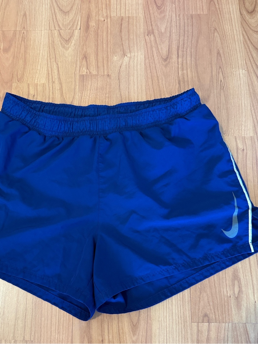 Nike Women's Royal Blue Athletic Running Shorts with Reflective Swoosh